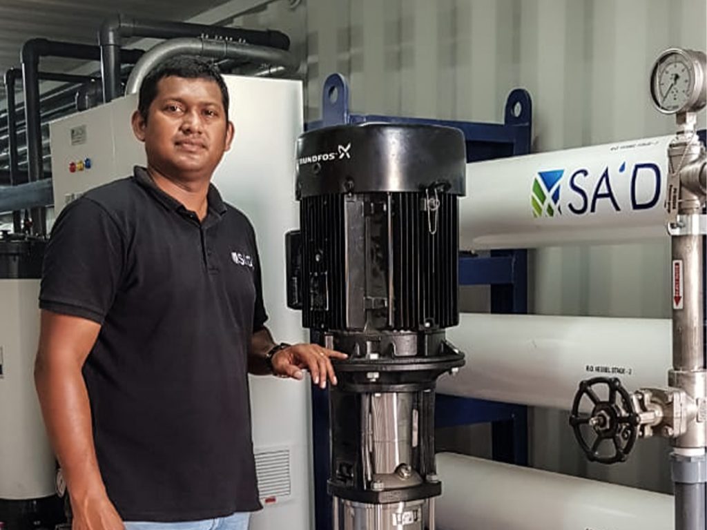 SA’DA technicians installing cutting-edge water treatment system for optimal performance.